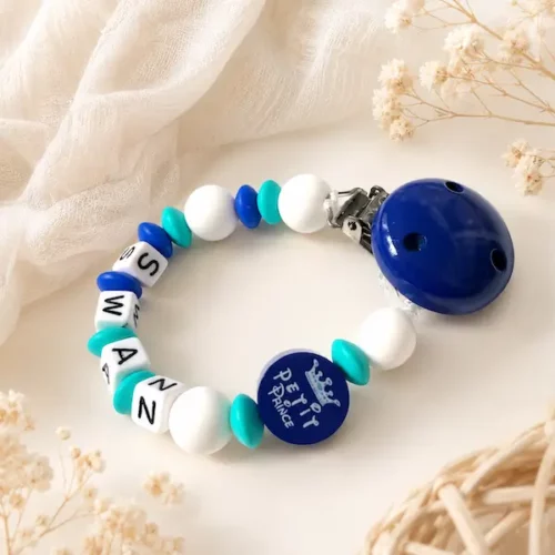 Attache tétine personnalisée garçon en silicone bleu turquoise et blanc avec prénom et médaillon Petit Prince