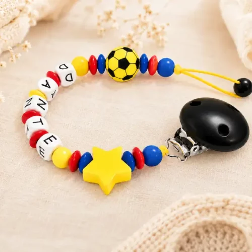 Attache sucette football personnalisée. couleur La Réunion